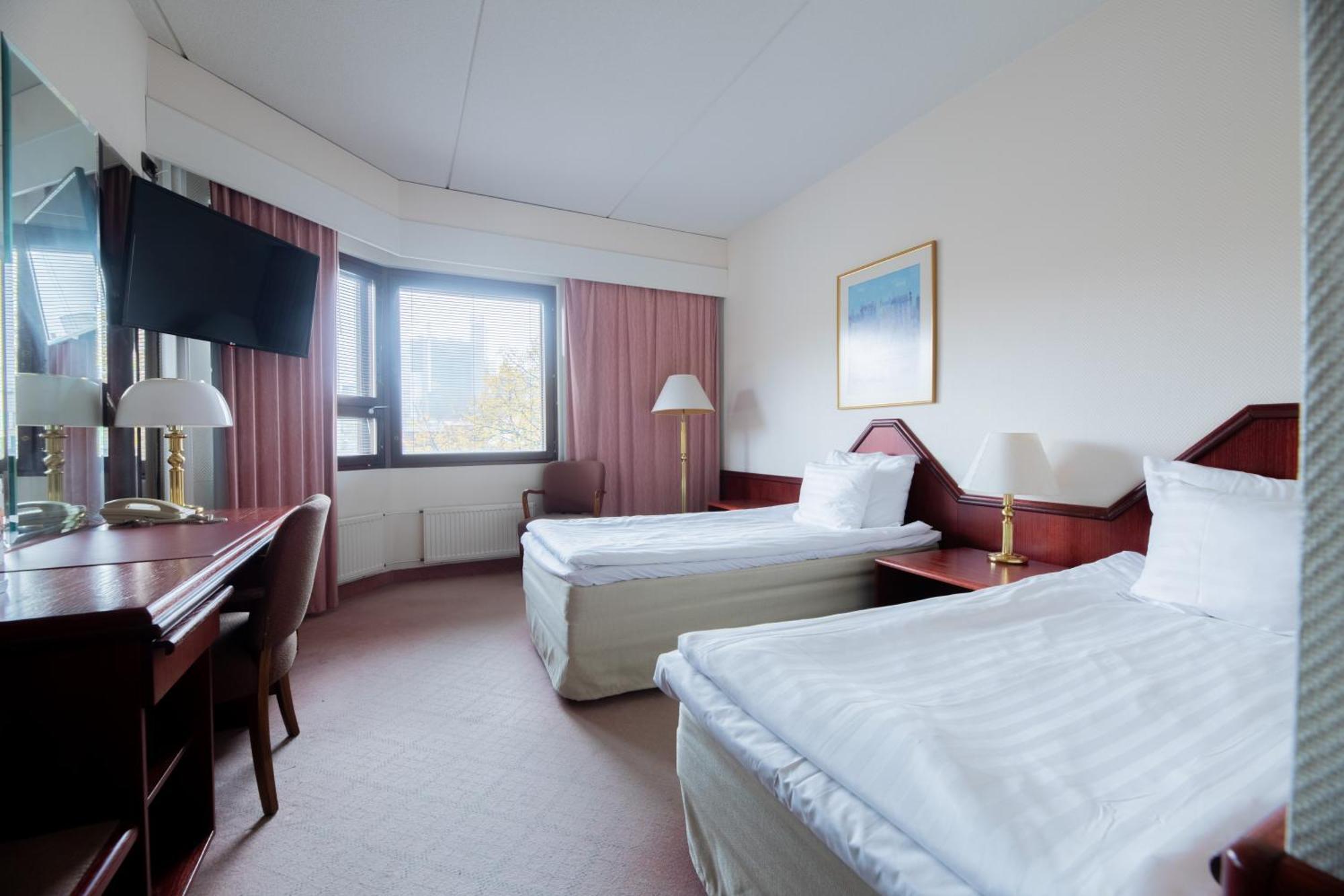 Hotel Oscar Varkaus Pokoj fotografie